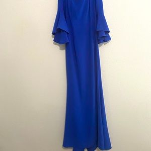 Vince Camuto off the should gown